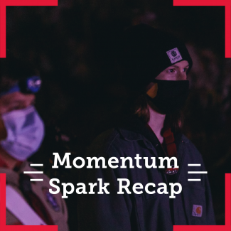 Two Arrowmen deeply focusing on something. The overlying text says Momentum Spark Recap
