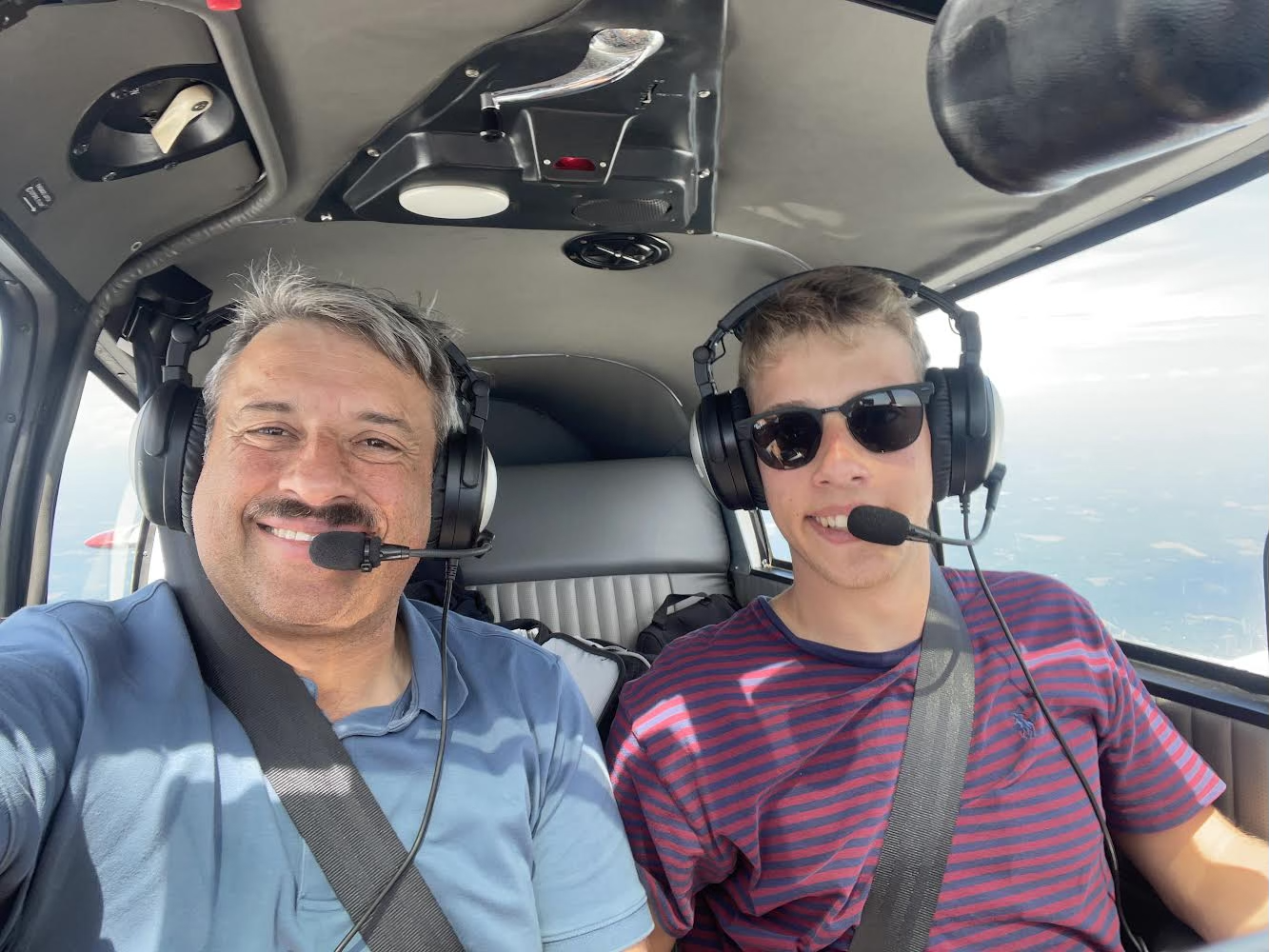 Willis Morales pilots his aircraft alongside his father, Joe