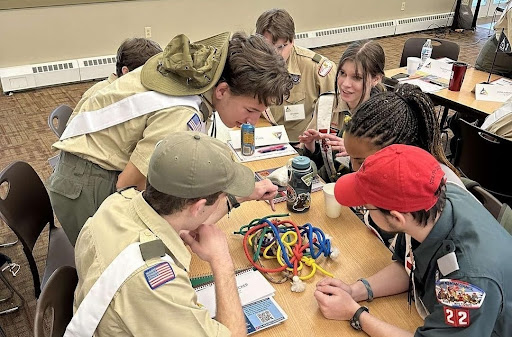 Arrowmen working on a puzzle during NLS. This is just one of the ways that crews learned how to work with each other during the course.