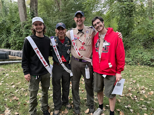 David pictured with the three lodge chiefs who served while he was the lodge adviser, including his son Daniel (pictured right).