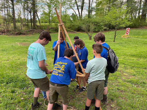Scouts compete in lashing competitions, working together to earn first place!