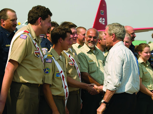 President George W. Bush greets and congratulates National Chief Jake Wellman alongside other national OA leadership at the conclusion of the 2008 program of emphasis: ArrowCorps.