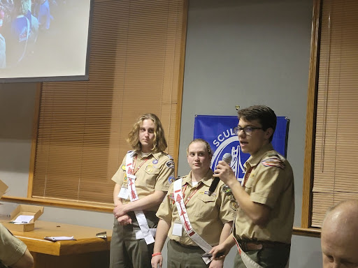 Section G9 Chief Collin Welke, with Vice Chief Kyle Land and Secretary Eli Levsky, presents their section’s “artwork,” or vision for how Section G9 will face and rise above challenges.