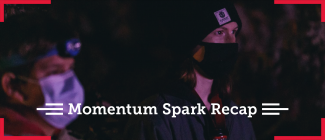 Two Arrowmen deeply focusing on something. The overlying text says Momentum Spark Recap